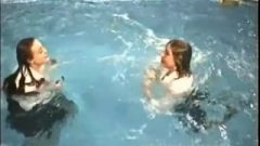 Two Clothed Girls In Pool